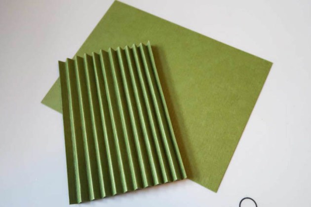 Create the accordion side panels by creasing a 4” x 4 ¼” card panel at ¼” increments.