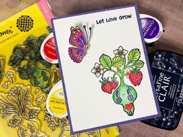 Handmade card featuring Waffle Flowers Let Love Grow stamps and Tsukneko's Memento inks.