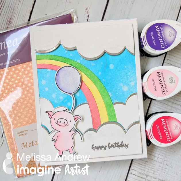 Adorable handmade birthday card featuring a piglet image with rainbows balloons and silver lined clouds.